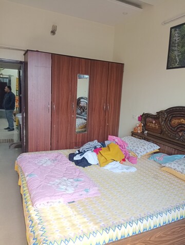 Bedroom in 2 BHK Builder Floor at Dhakoli Village – for Sale