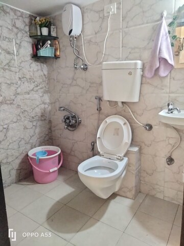 Bathroom in 2 BHK Apartment at Vinay Unique Gardens, Virar West – for Sale