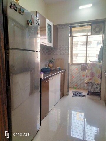 Kitchen in 2 BHK Apartment at Vinay Unique Gardens, Virar West – for Sale
