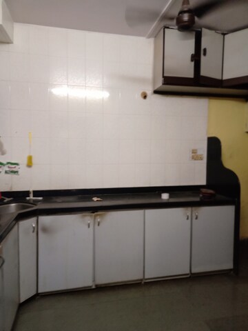 Kitchen in 2 BHK Apartment at Siddhartha Darshan CHS, Naupada – for Sale