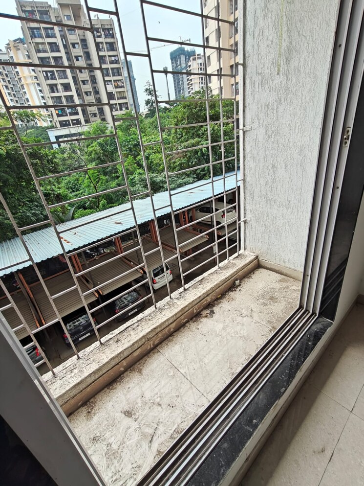 Balcony, cosmos-classique 2 Bedroom 650 Sq.Ft. Apartment In Ghodbunder Road Thane 7851261