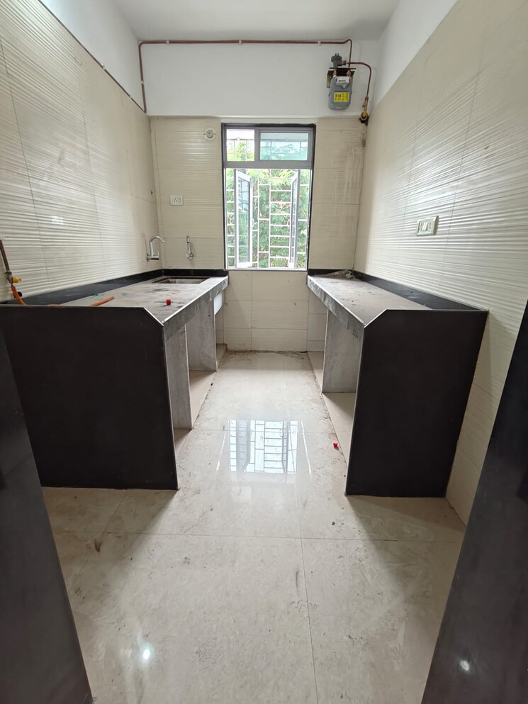 Kitchen, cosmos-classique 2 Bedroom 650 Sq.Ft. Apartment In Ghodbunder Road Thane 7851304