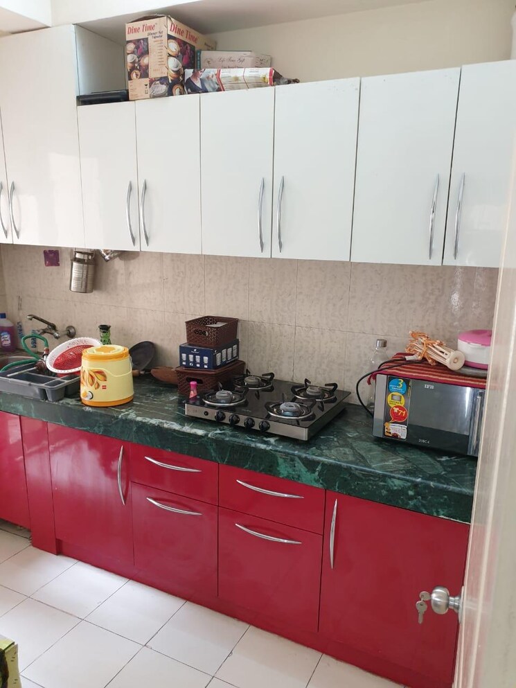 Kitchen, paras-tierea 2 Bedroom 1045 Sq.Ft. Apartment In Sector 137 Noida 7851604