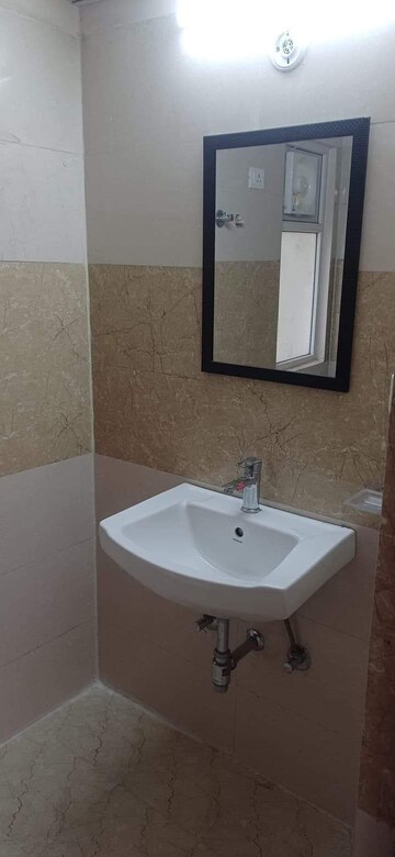 Bathroom in 2 BHK Apartment at Amrapali Golf Homes, Sector 4, Greater Noida – for Sale