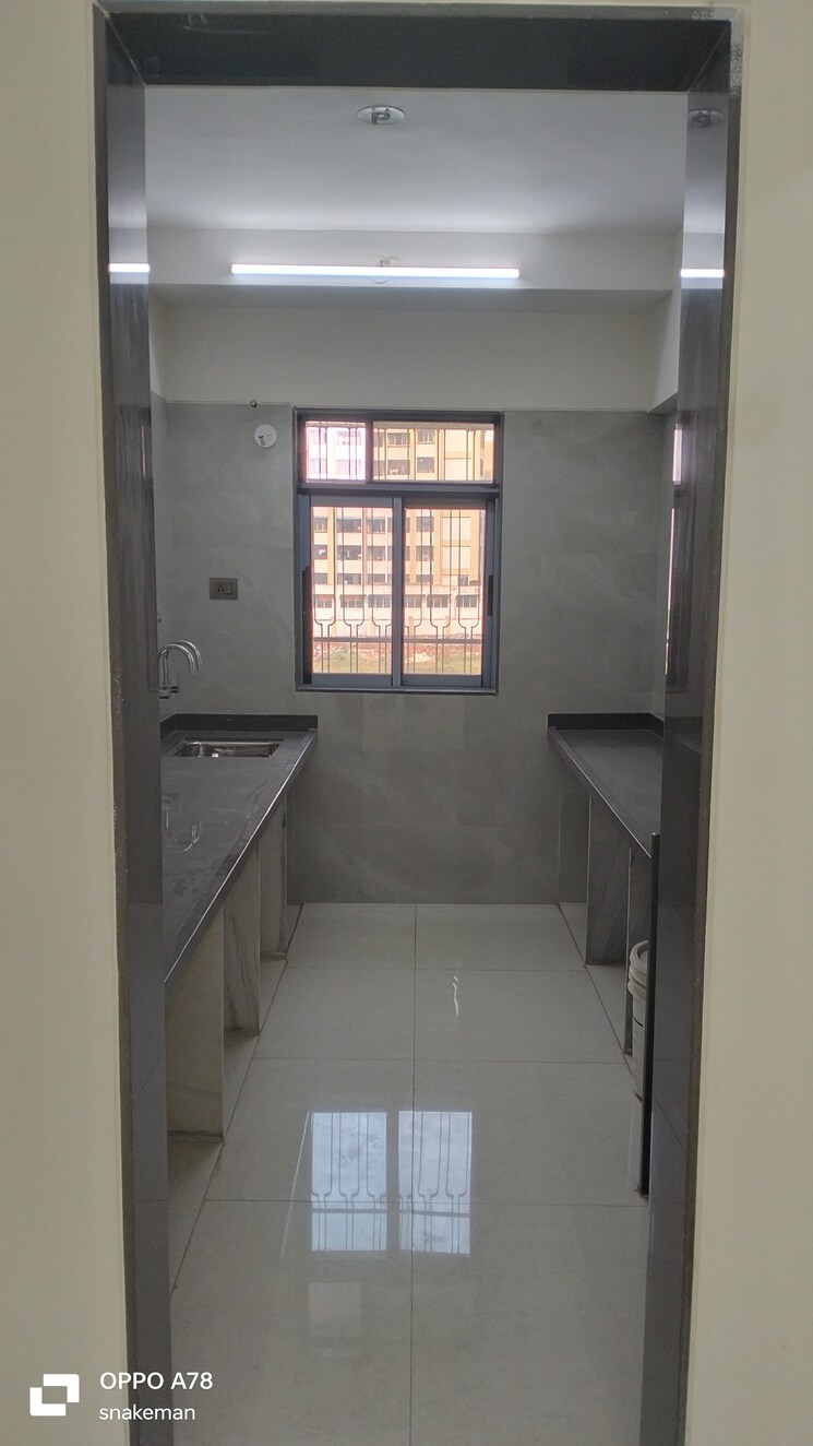 Kitchen, reliance-gold 2 Bedroom 845 Sq.Ft. Apartment In Ambernath Thane 7851909