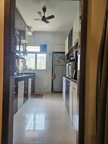 Kitchen in 2 BHK Apartment at Hill Palace CHS Ltd, Pokhran Road No 1 – for Sale