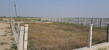 Plot Area in  Plot at Upsidc Site B – for Sale