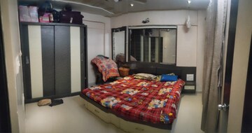 Bedroom in 1.5 BHK Apartment at Veena Nagar CHS, Mulund West – for Sale