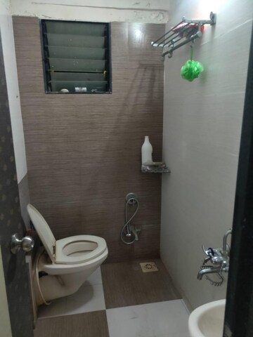 Bathroom in 1.5 BHK Apartment at Veena Nagar CHS, Mulund West – for Sale