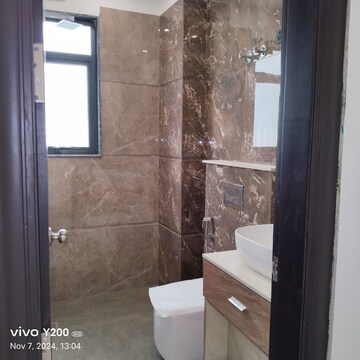 Bathroom in 3.5 BHK Apartment at Orchid Petals, Sector 49 – for Sale