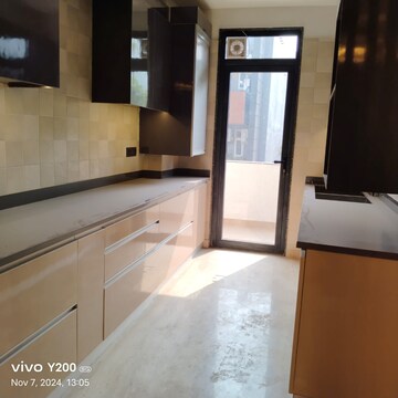 Kitchen in 3.5 BHK Apartment at Orchid Petals, Sector 49 – for Sale