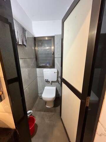 Bathroom in 1 BHK Apartment at Swastik Residency 1, Ghodbunder Road – for Sale