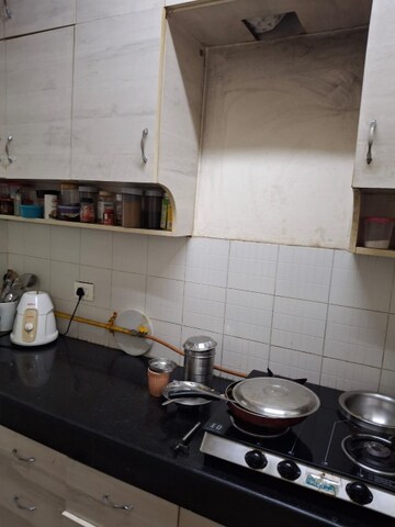 Kitchen in 2 BHK Apartment at Aditya Urban Casa, Sector 78 – for Sale
