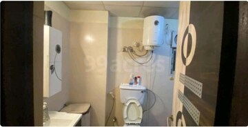 Bathroom in 3 BHK Apartment at Raj Nagar Extension – for Sale