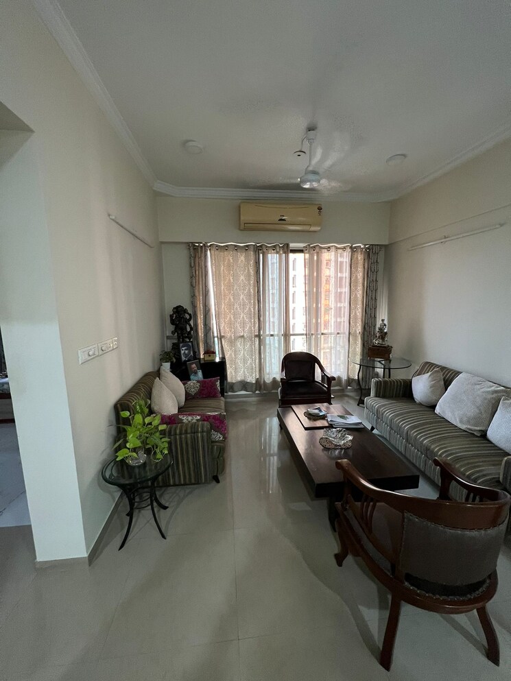 Living Room, celestia-spaces 2 Bedroom 840 Sq.Ft. Apartment In Sewri Mumbai 7854331