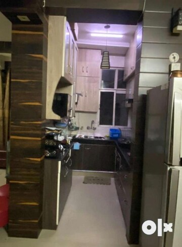Kitchen in 2 BHK Apartment at Paramount Symphony, Sain Vihar – for Sale
