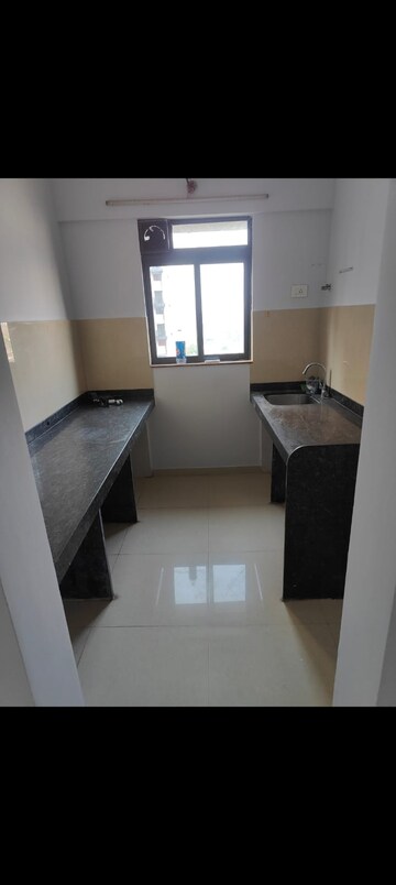 Kitchen in 1 BHK Apartment at Lodha Palava City, Dombivli East – for Sale
