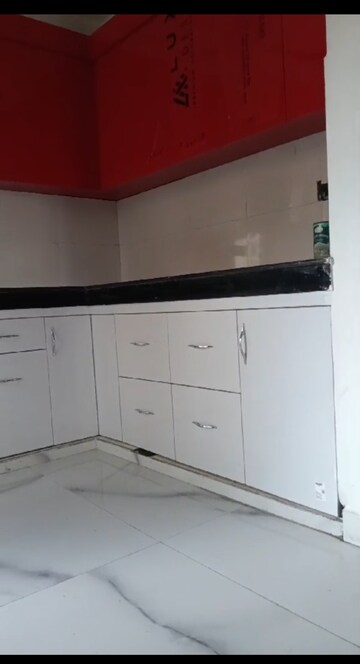 Kitchen in 2 BHK Apartment at DevLandcon Hitaishi Heights, Raj Nagar Extension – for Sale