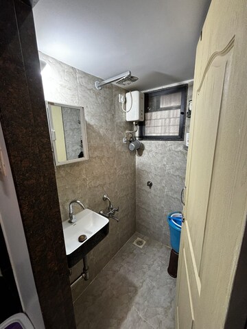 Bathroom in 1 BHK Apartment at Dhaval Sunrise Orlem, Malad West – for Sale