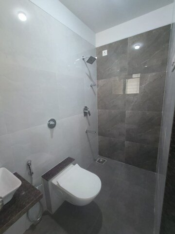 Bathroom in 1 BHK Apartment at Raunak Unnathi Woods Phase 7 A And B, Ghodbunder Road – for Sale