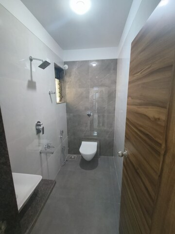 Bathroom in 1 BHK Apartment at Raunak Unnathi Woods Phase 7 A And B, Ghodbunder Road – for Sale