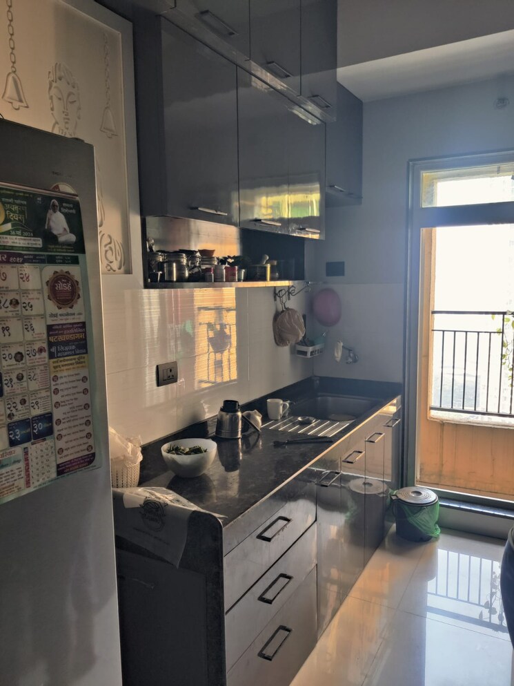 Kitchen, rustomjee-urbania 2 Bedroom 831 Sq.Ft. Apartment In Majiwada Thane 7856815