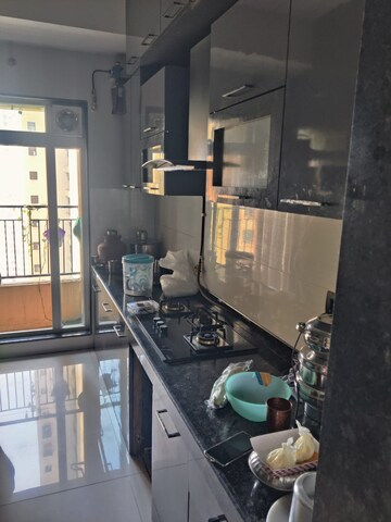 Kitchen in 2 BHK Apartment at Rustomjee Urbania, Majiwada – for Sale