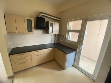 Kitchen in 3 BHK Apartment at Amrapali Platinum, Sector 119 – for Sale