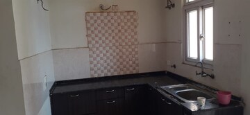 Kitchen in 3 BHK Apartment at Amrapali Platinum, Sector 119 – for Sale