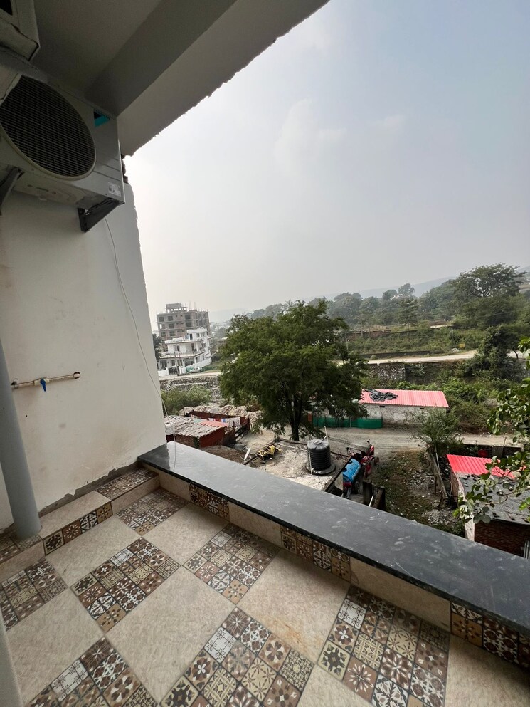 Balcony, aman-luxury-apartments 1 Bedroom 750 Sq.Ft. Apartment In Sahastradhara Road Dehradun 7857560