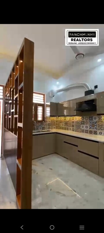 Kitchen in 3 BHK Builder Floor at Aman Luxury Apartments, Sahastradhara Road – for Sale