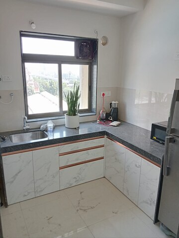 Kitchen in 1 BHK Apartment at Runwal Eirene, Balkum Pada – for Rent