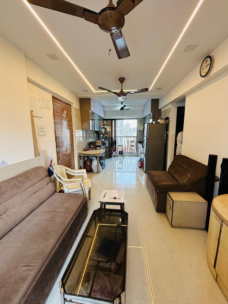 Living Room, kamla-prasanna-jeevan 2 Bedroom 581 Sq.Ft. Apartment In Borivali West Mumbai 7857860