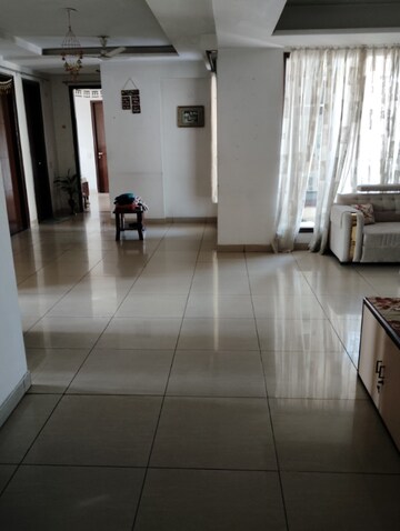 Living Room in 4 BHK Apartment at Hanumant Bollywood Heights-2, Dhakoli Village – for Sale