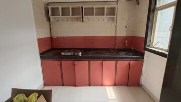 Kitchen in 2 BHK Apartment at Sanghvi Hills, Ghodbunder Road – for Sale