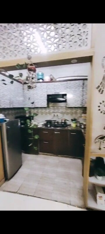 Kitchen in 3 BHK Builder Floor at Shakti Khand iv – for Sale