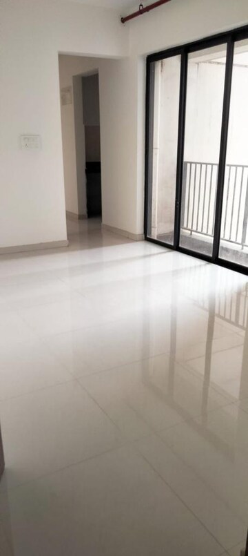 Living Room in 1 BHK Apartment at Mohan Palms Badlapur , Katrap – for Sale