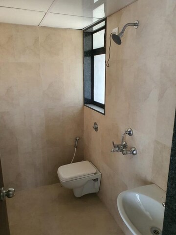 Bathroom in 1 BHK Apartment at Mohan Palms Badlapur , Katrap – for Sale
