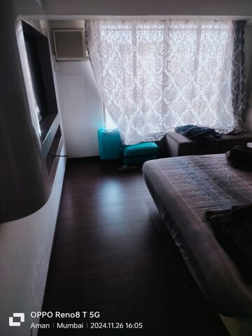 Living Room in 2 BHK Apartment at Palash Towers, Andheri West – for Rent
