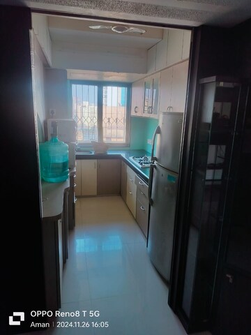Kitchen in 2 BHK Apartment at Palash Towers, Andheri West – for Rent