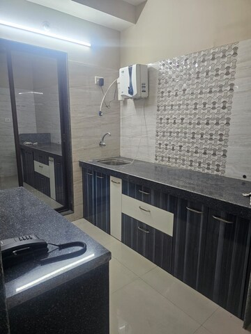Kitchen in 1 BHK Builder Floor at Imperial Splendora, Vasai East – for Sale
