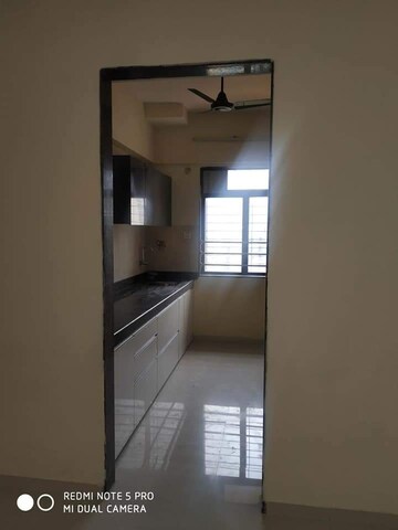 Kitchen in 3 BHK Apartment at Satguru Solitaire, Kasarvadavali – for Sale
