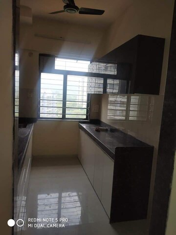 Kitchen in 3 BHK Apartment at Satguru Solitaire, Kasarvadavali – for Sale