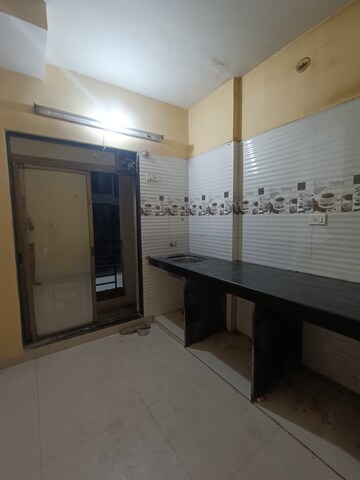 Kitchen in 1 BHK Apartment at Ostwal Pride, Mira Road – for Sale