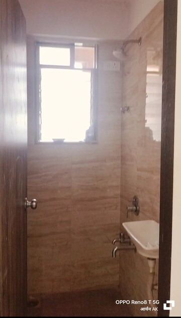 Bathroom in 1 BHK Apartment at Squarefeet Joy square, Kasarvadavali – for Sale