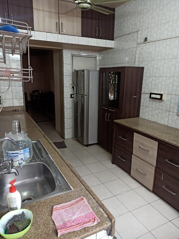 Kitchen in 1 BHK Apartment at Anand Yog Society, Viman Nagar – for Sale