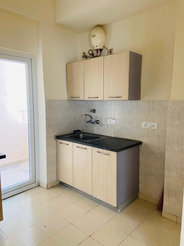 Kitchen in 3.5 BHK Apartment at Amarpali Exotica, Sector 50 – for Sale