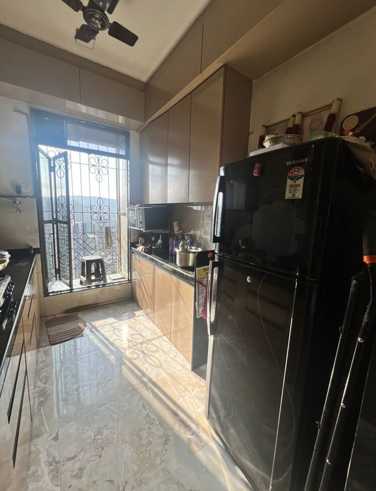 Kitchen, larkins-pride-palms 2 Bedroom 900 Sq.Ft. Apartment In Kolshet Road Thane 7863638