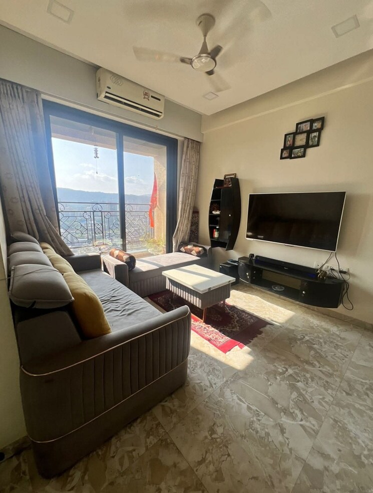 Living Room, larkins-pride-palms 2 Bedroom 900 Sq.Ft. Apartment In Kolshet Road Thane 7863638