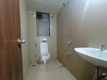Bathroom in 2 BHK Apartment at Runwal Eirene, Balkum Pada – for Rent